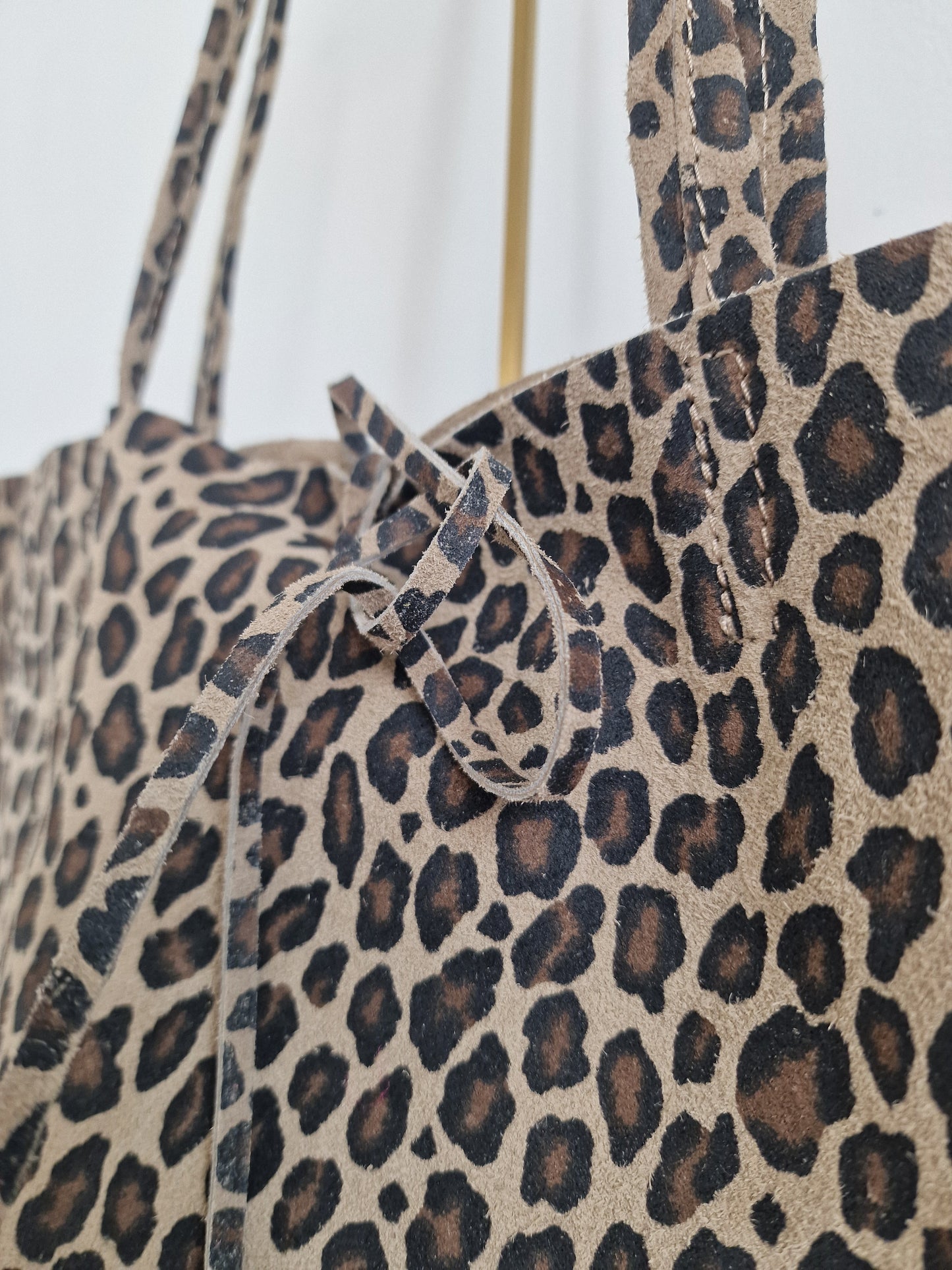 Leopard leren handtas met touwtjes