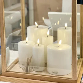 White LED candle 7,5 x 10 cm.