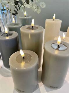 Sand LED candle 7,5 x 20 cm.
