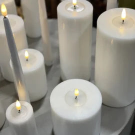 White LED candle  7,5 x 15 cm.